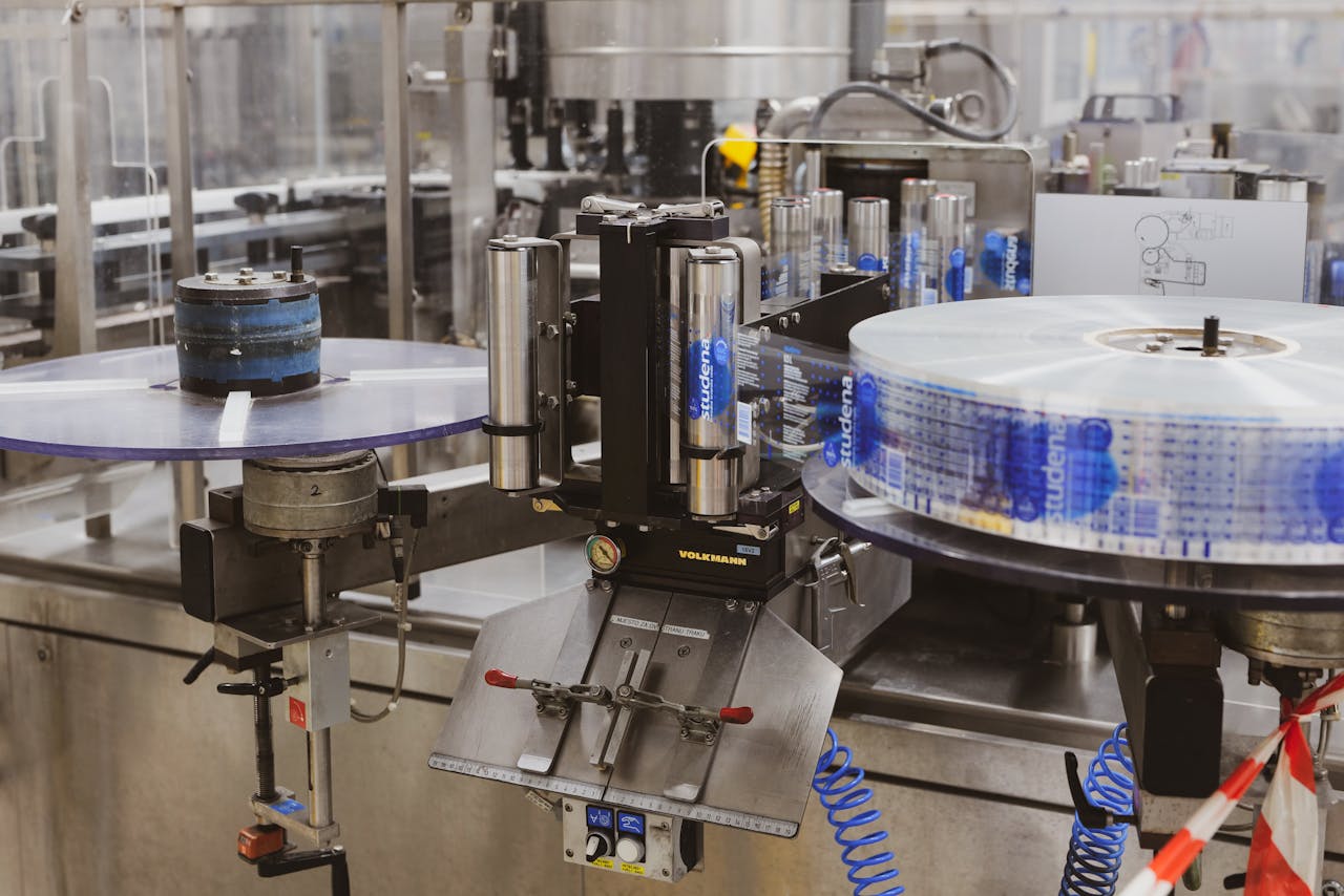 Services Close-up of automated machinery in a Lipik factory's production line.